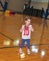 Gracie, 3, gets ready to throw like a girl at the Pigskin Princess Project.  Permission granted from all parents to use photos. 